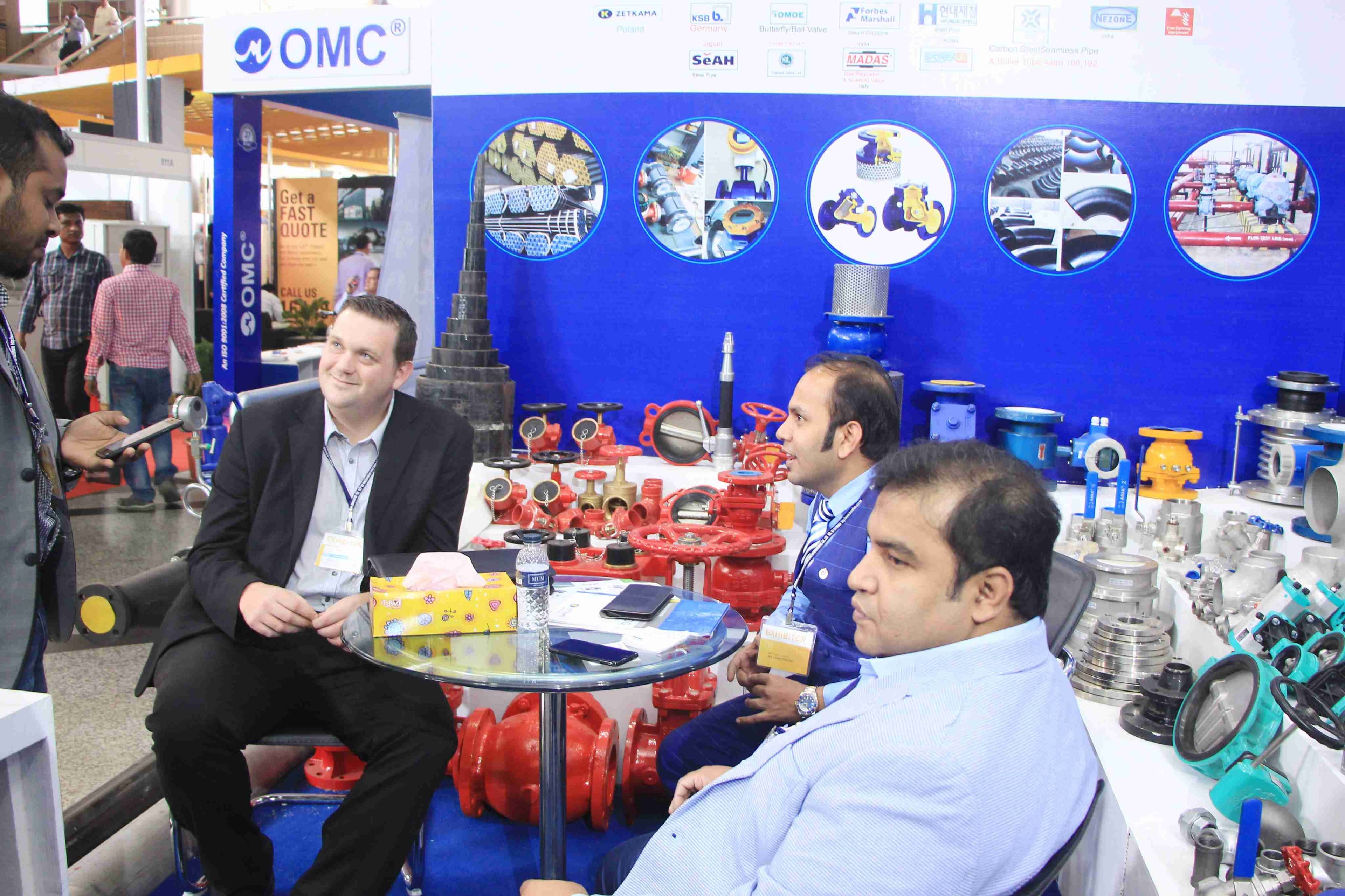 Meeting with an international principal at the booth